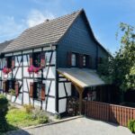 Fachwerkdoppelhaushälfte mit großem Grundstück in Eitorf